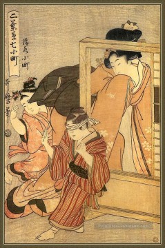 une femme observe deux enfants Kitagawa Utamaro japonais Peinture à l'huile